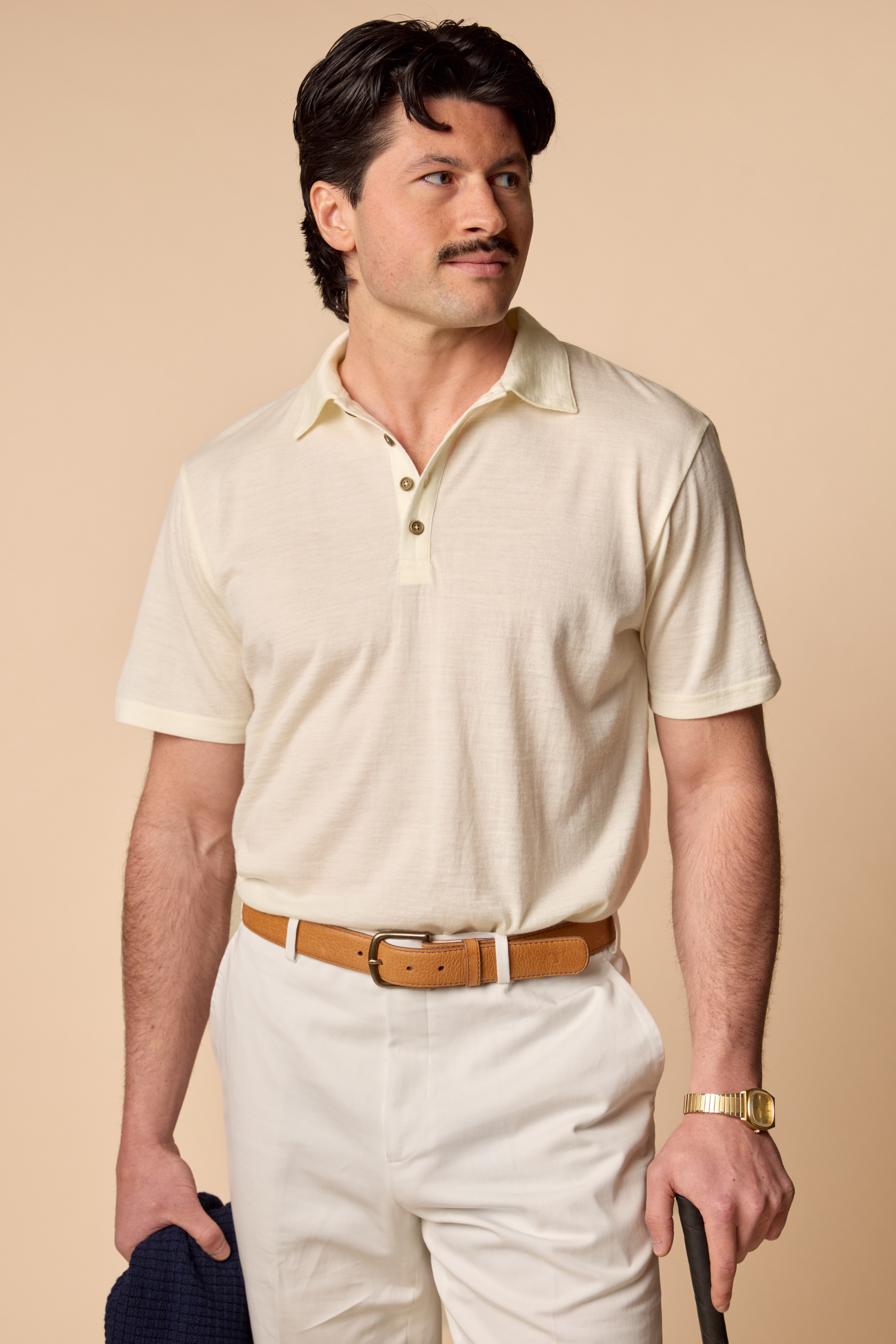 Sir W. Merino George polo in white, front view. Shirt tucked.