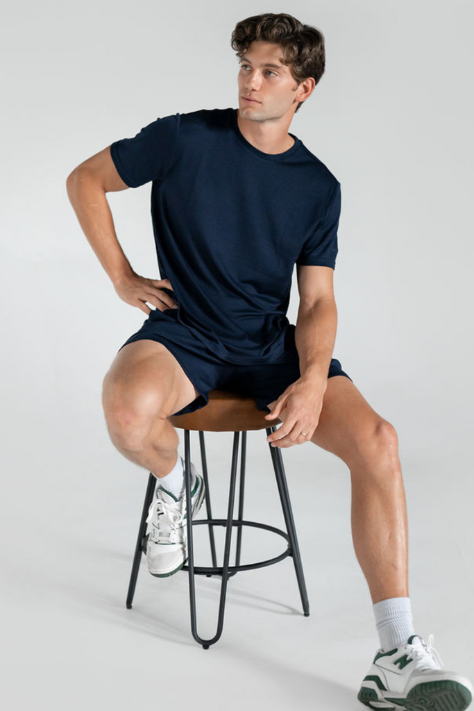 Men’s 100 % Merino Wool Tee on model sitting