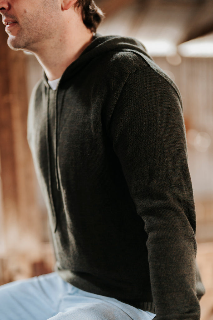Man wearing Dark Green Merino Wool Hoodie